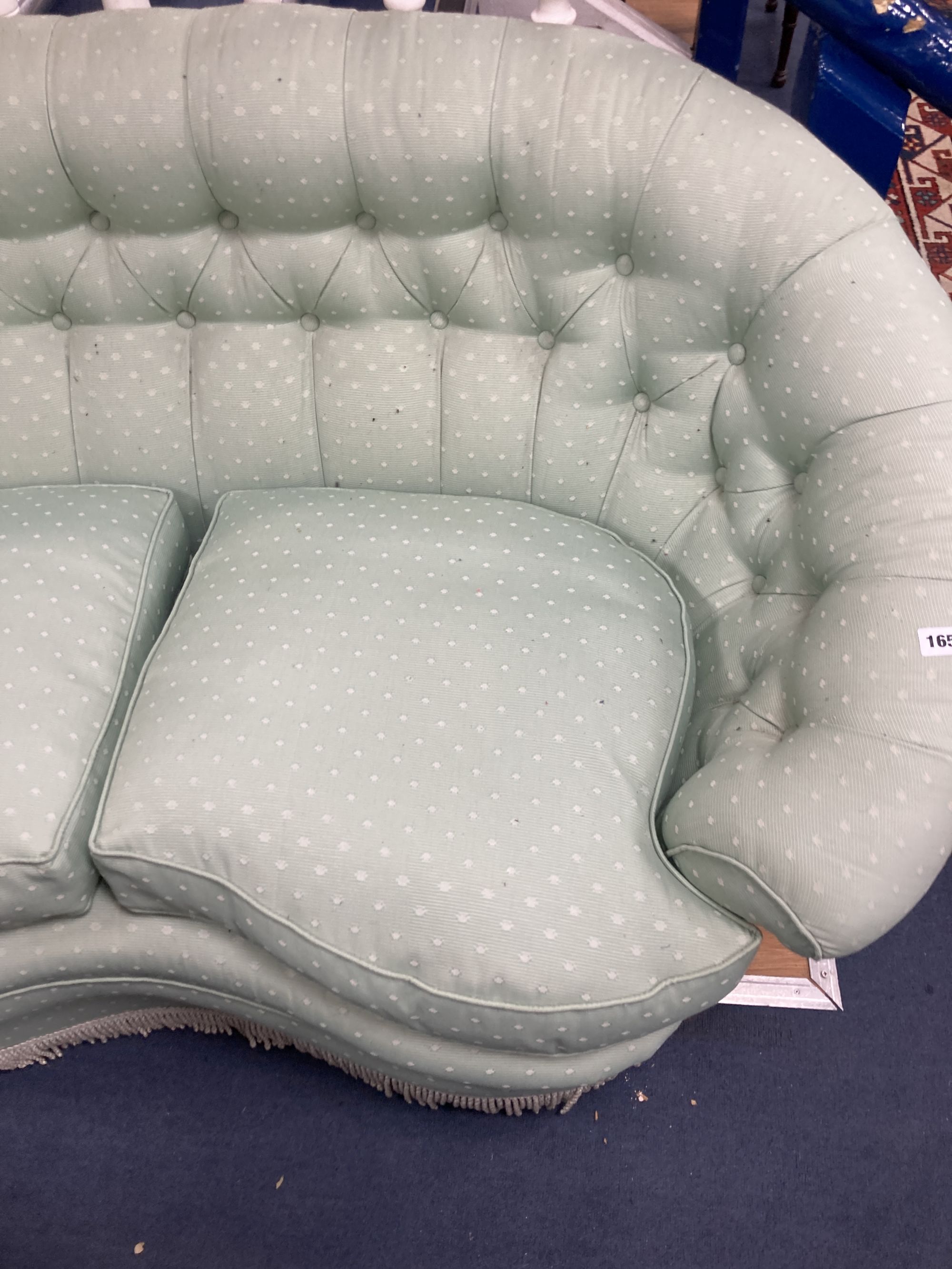 A tub framed two seater settee upholstered in patterned pale green fabric, length 150cm, depth 80cm, height 78cm